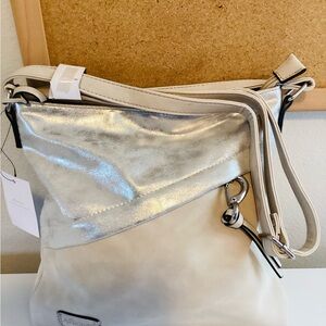 stunning cream and silver shoulder bag that's perfect for any occasion.